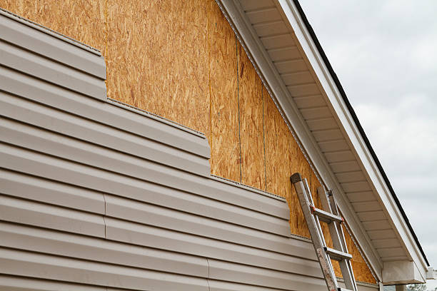Professional Siding Installation technician working in Scottsville, NY